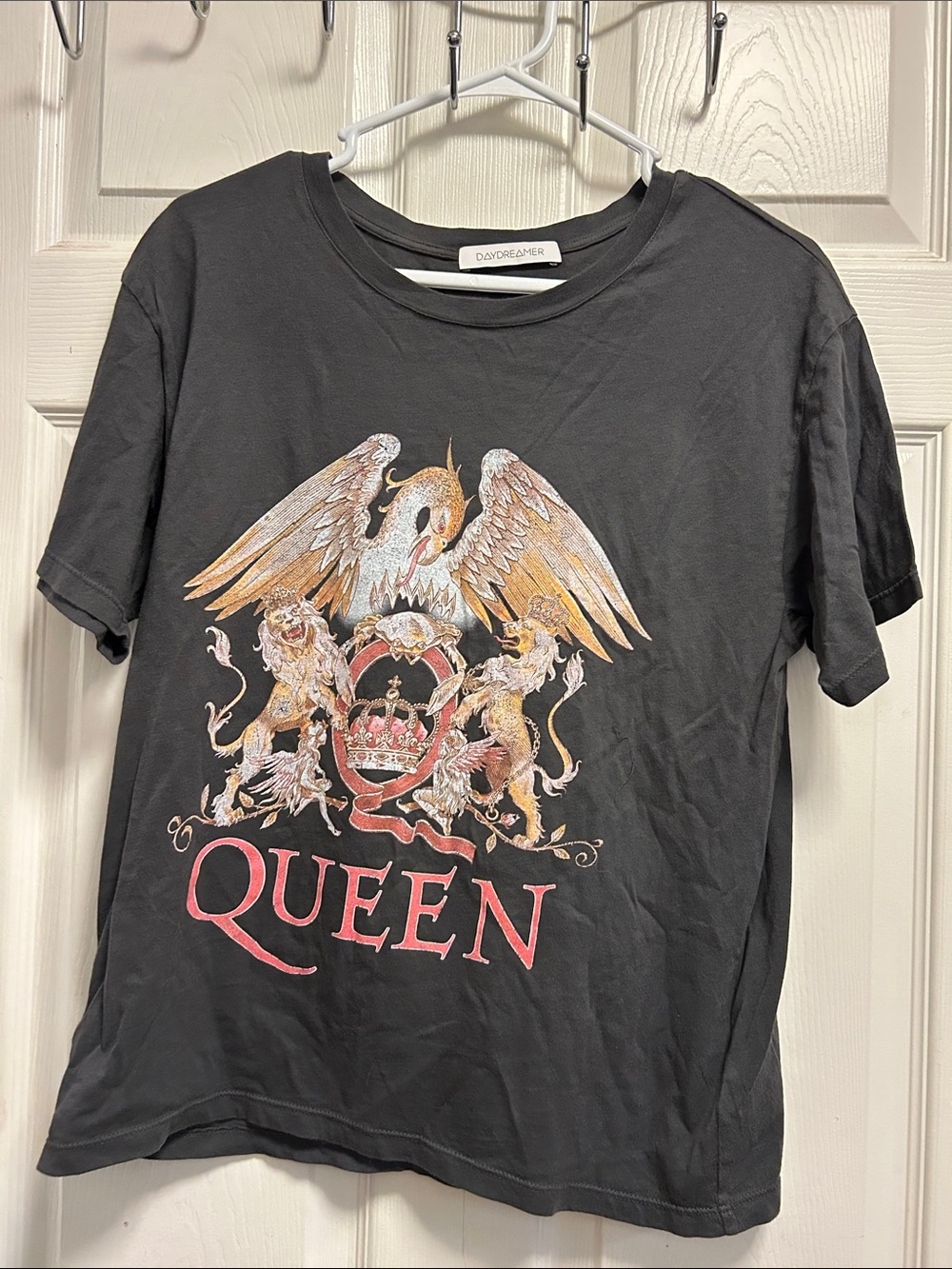 Daydreamer Black Tee with Gold & Red Crest